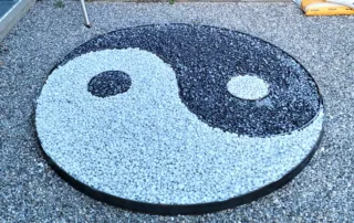 Metalleinfassung ying-yang